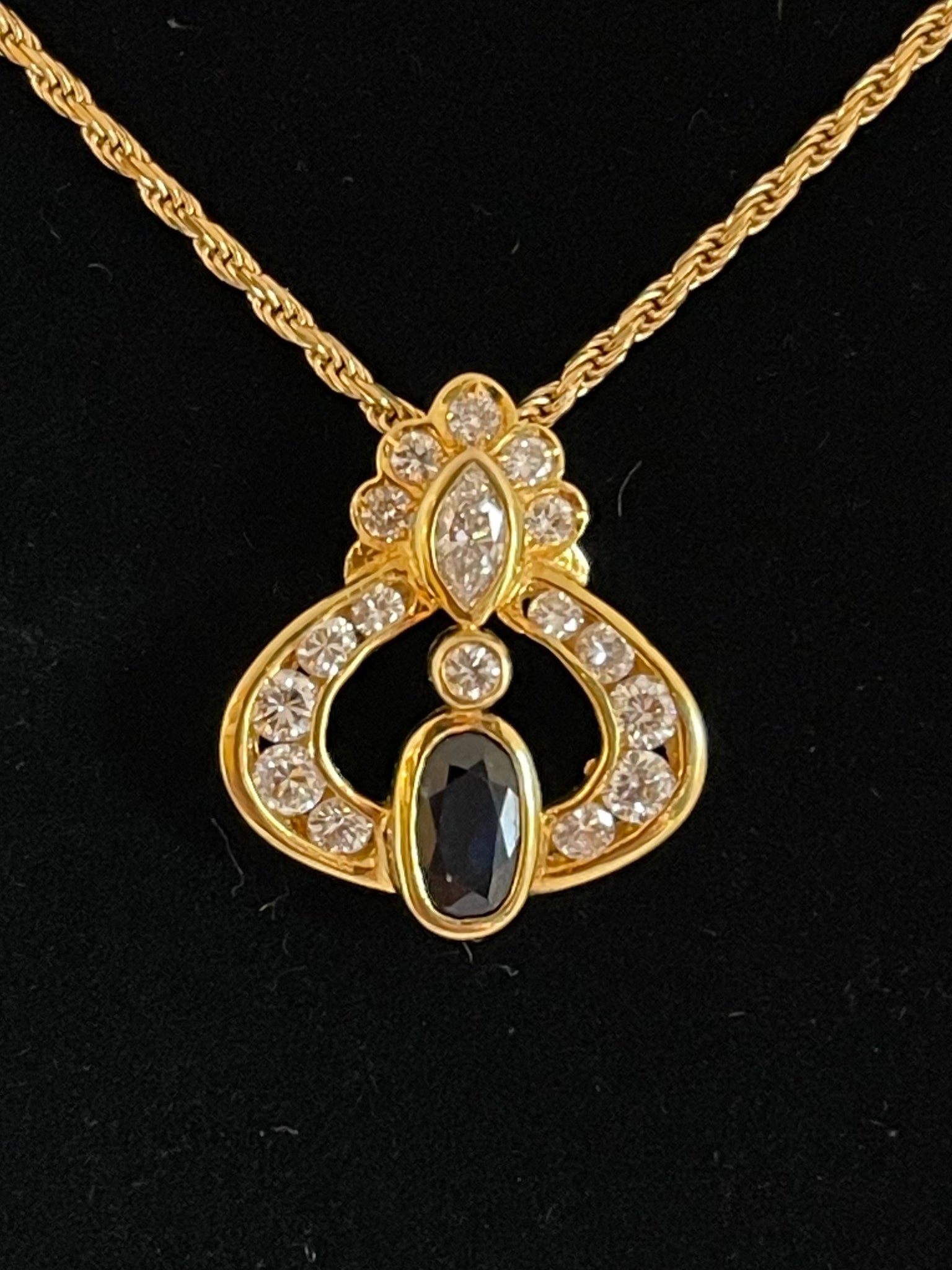Sapphire 0.57ct and Diamond 0.62ct 18ct Gold Pendant and Chain